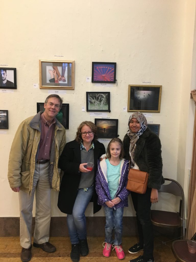 Andi and her host family at an art show