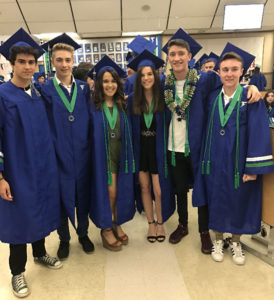 Thom graduating with his American classmates