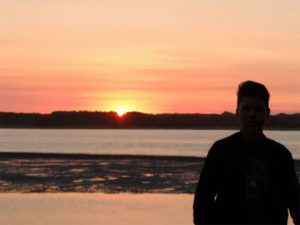 Jakob, an exchange student from Germany, enjoying an Oregon sunset