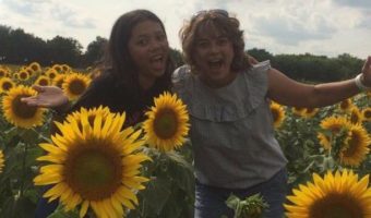Hiede from the Philippines and Her Host Mom from Kansas Pose in Sunflower Field | Academic Year in America (AYA)