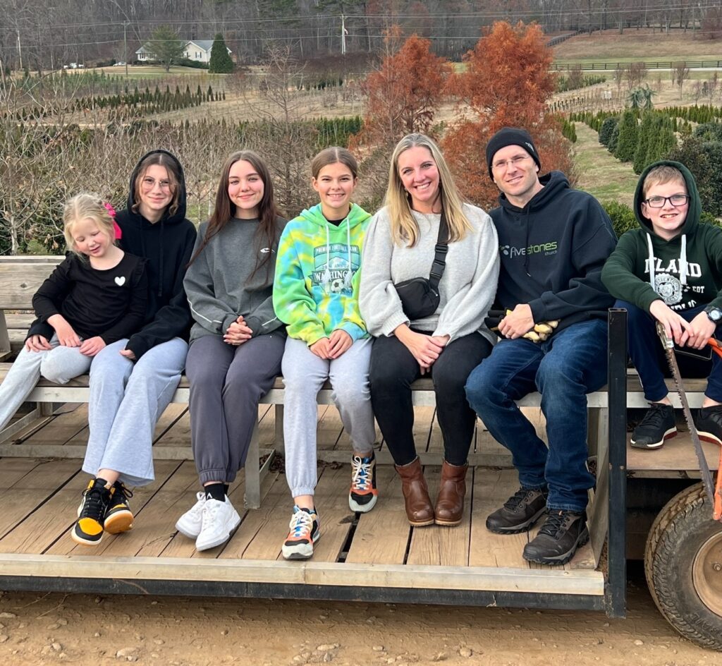 aya exchange students at a hayride with host family